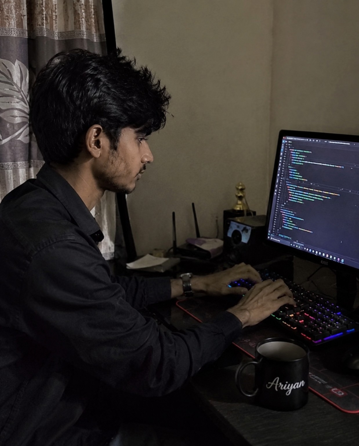 Ariyan Chowdhury working at a computer